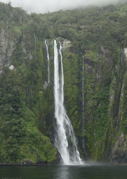 Waterfall-In-Dusky-Sound: One of the many tall waterfalls that scatter the Sounds in the South Island of New Zealand, this one was taken in Dusky Sound.